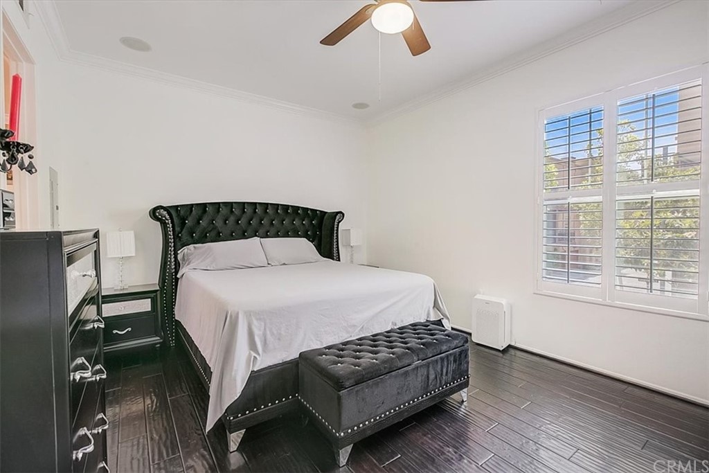 326 District Court Fullerton, CA 92832 - Photo 29 of 41 a bedroom with a bed lamp and window