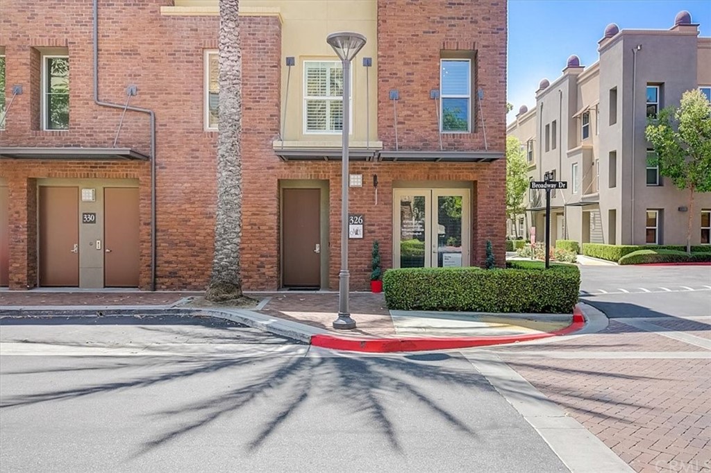 326 District Court Fullerton, CA 92832 - Photo 3 of 41 a front view of a brick building