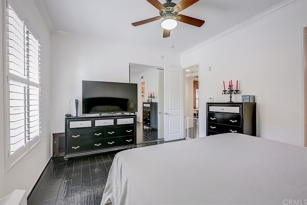 326 District Court Fullerton, CA 92832 - Photo 31 of 41 a bedroom with a bed and a flat screen tv