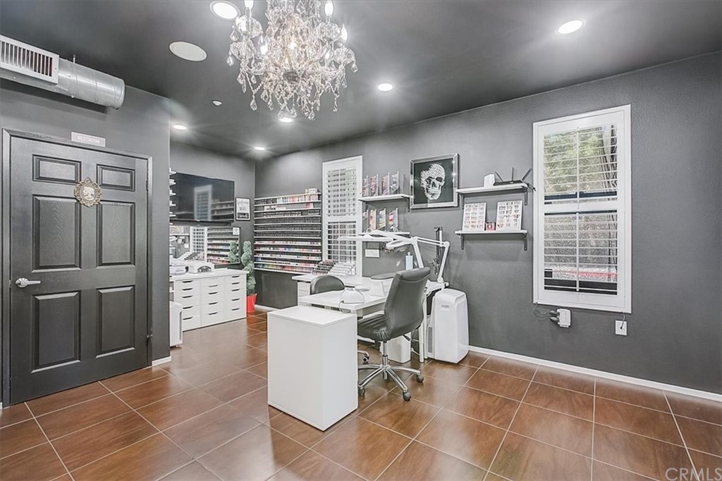 326 District Court Fullerton, CA 92832 - Photo 6 of 41 a view of a livingroom with workspace and a window