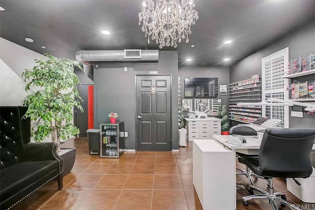 326 District Court Fullerton, CA 92832 - Photo 10 of 41 a living room with furniture and a potted plant