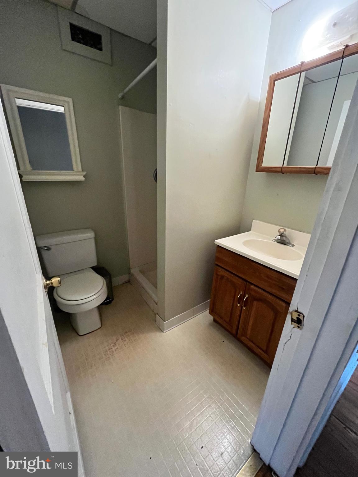 11 New Street, Unit 4 Newark, DE 19711 - Photo 11 of 16 a bathroom with a sink and a toilet