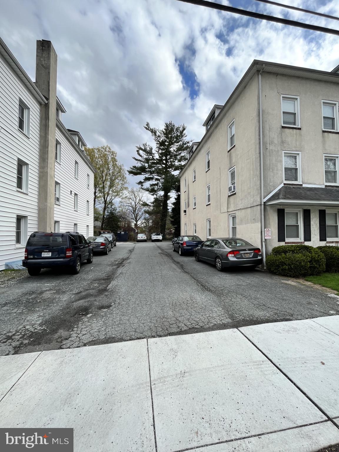 11 New Street, Unit 4 Newark, DE 19711 - Photo 2 of 16 a view of a street with cars