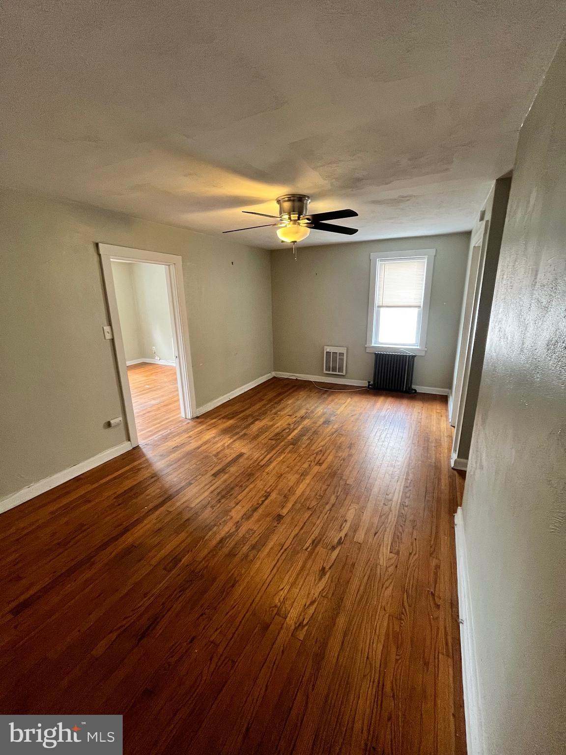 11 New Street, Unit 4 Newark, DE 19711 - Photo 4 of 16 a view of a room with wooden floors and stairs