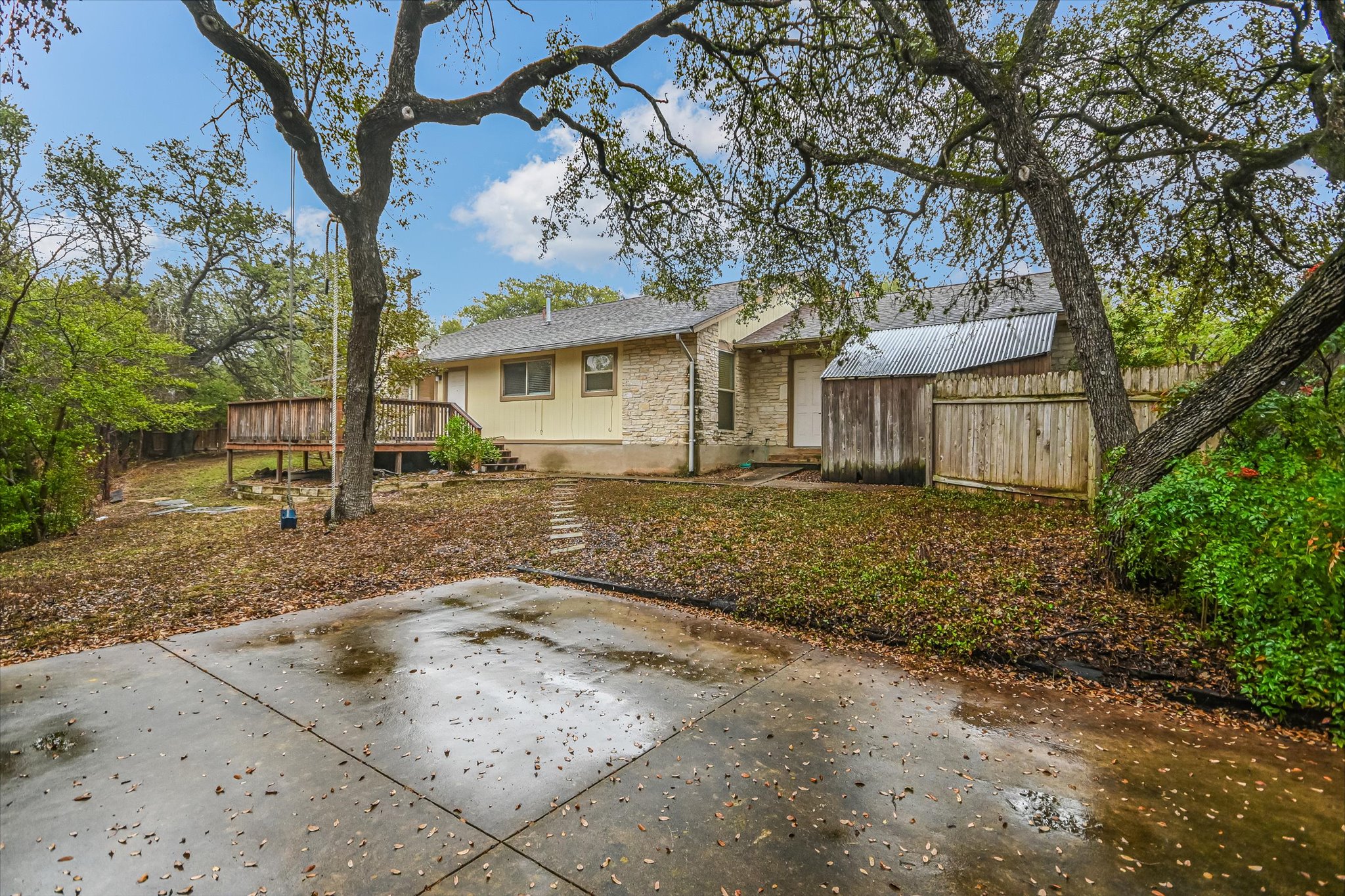 3207 Eanes Circle, Unit A Austin, TX 78746 - Photo 13 of 14 a view of a house with a tree in the yard