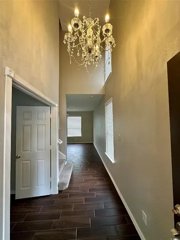 a view of entryway with wooden floor