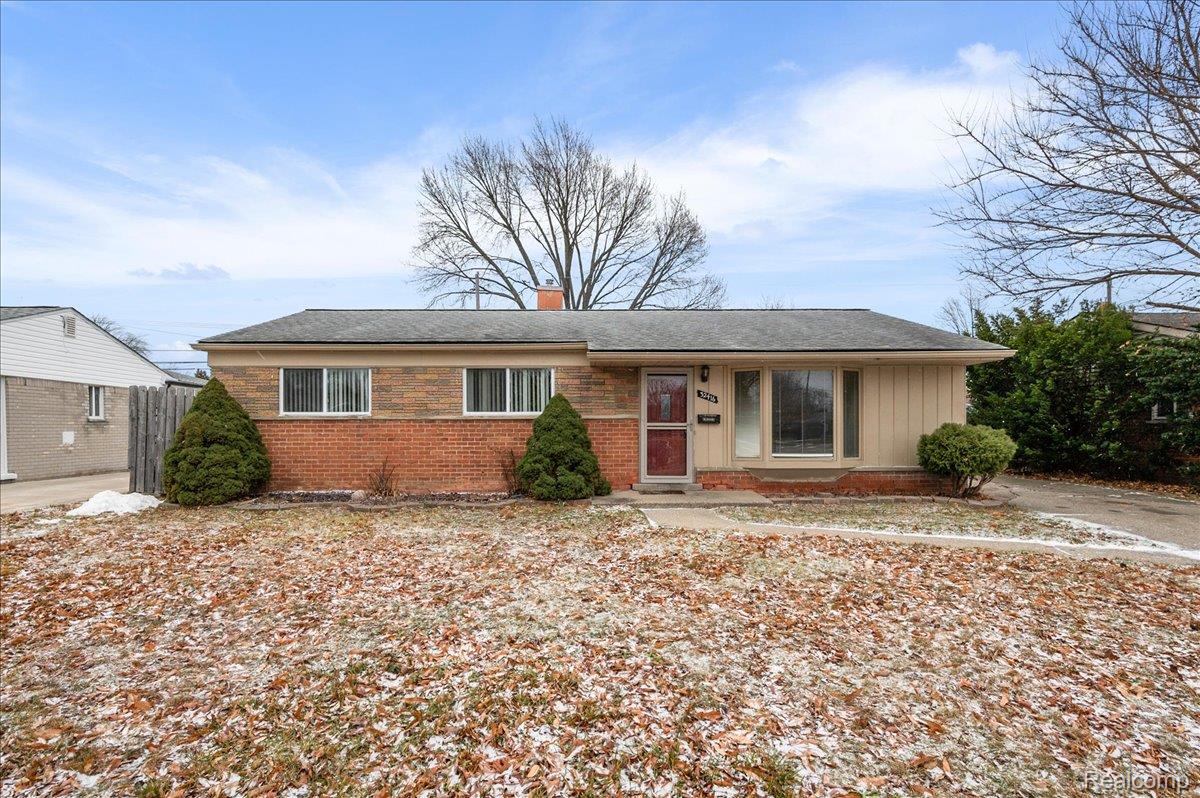 32416 Exeter Drive Warren, MI 48092 - Photo 2 of 33 Single story home with a chimney, brick siding, and board and batten siding