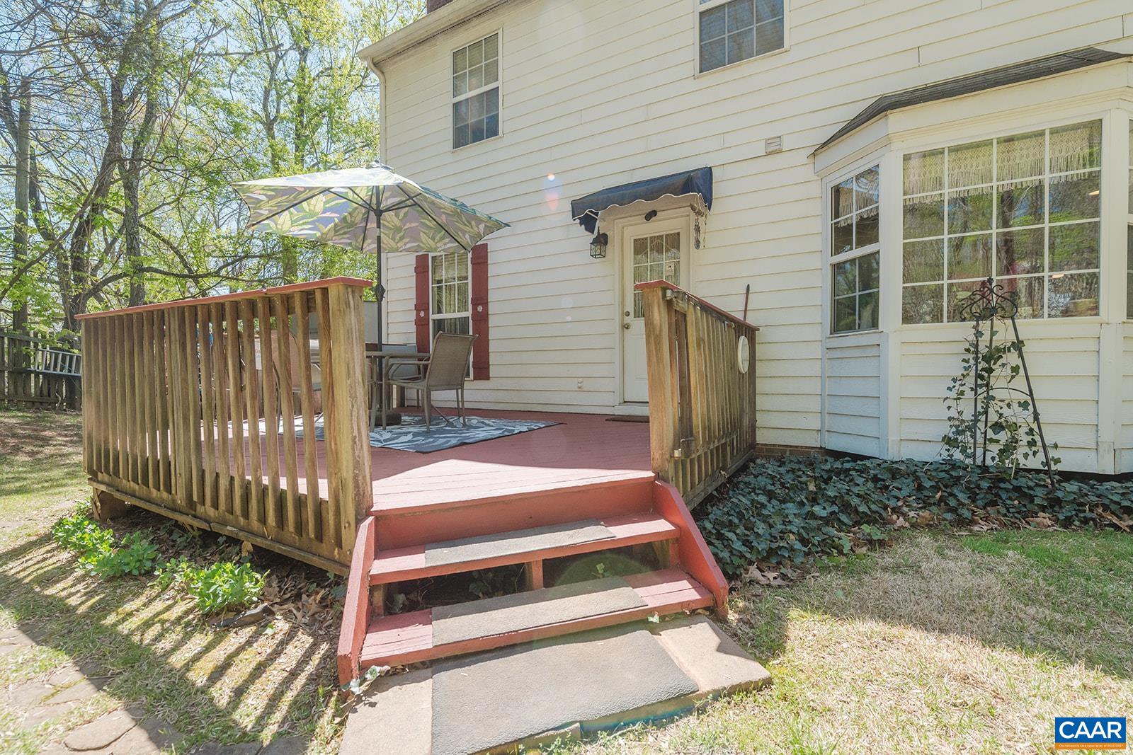 1642 Polo Grounds Road Charlottesville, VA 22911 - Photo 16 of 44 a front view of a house with a yard
