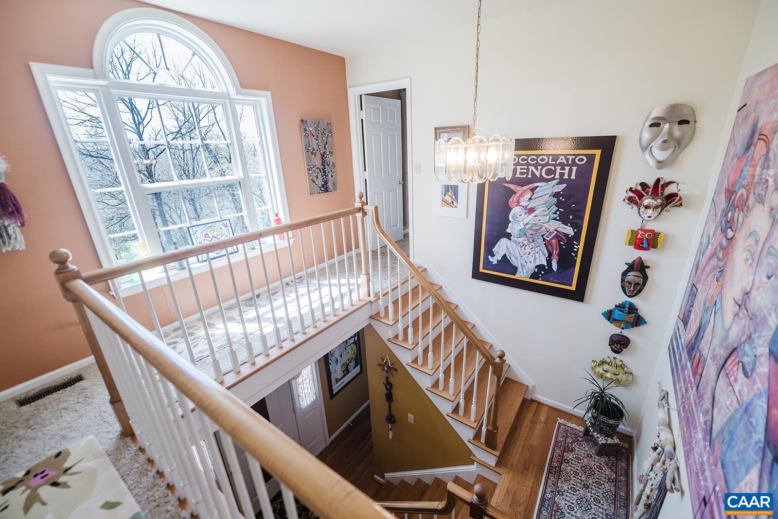 1642 Polo Grounds Road Charlottesville, VA 22911 - Photo 34 of 44 a view of an entryway wooden floor and chandelier