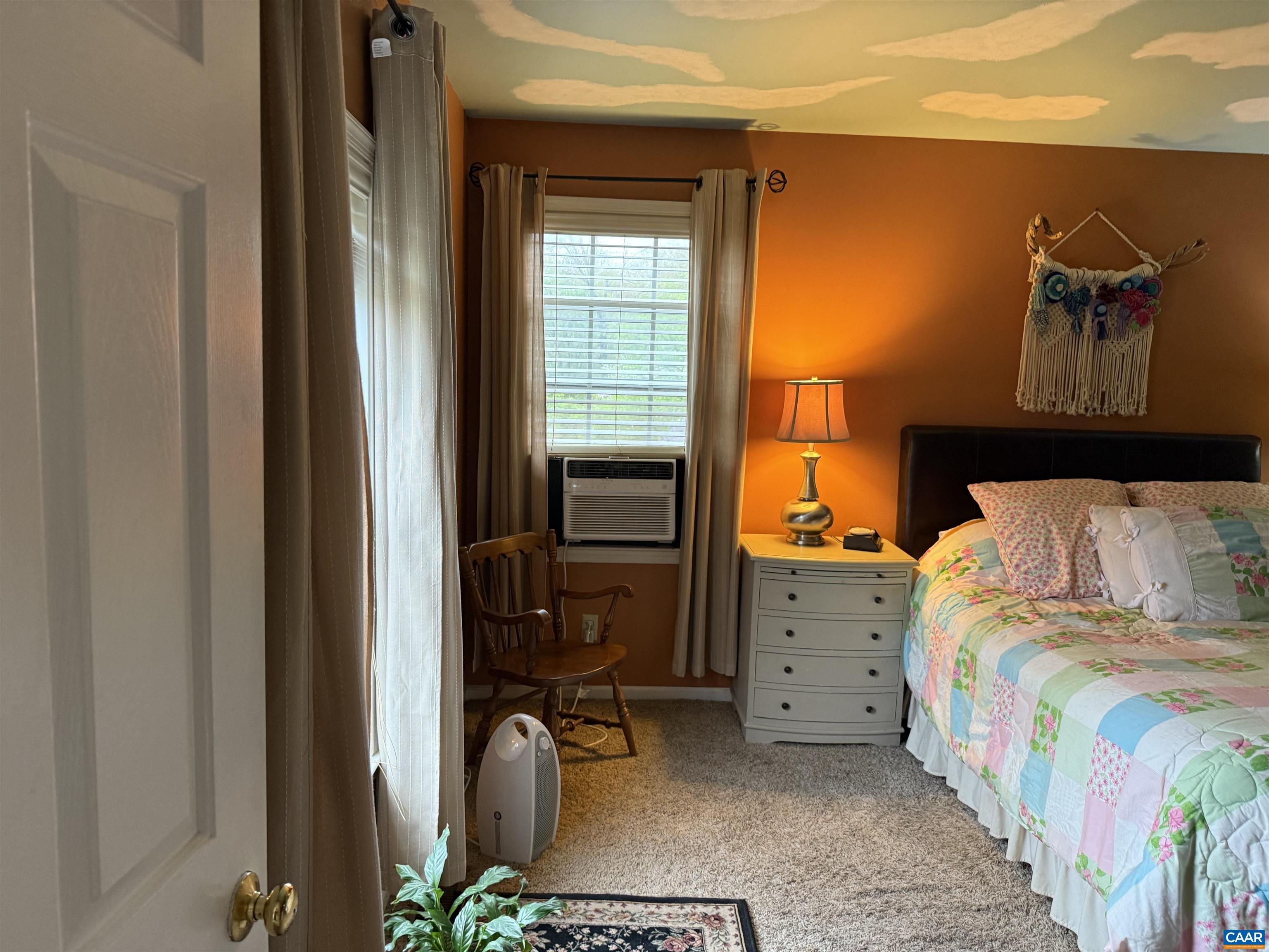 1642 Polo Grounds Road Charlottesville, VA 22911 - Photo 36 of 44 a bedroom with a bed and a window