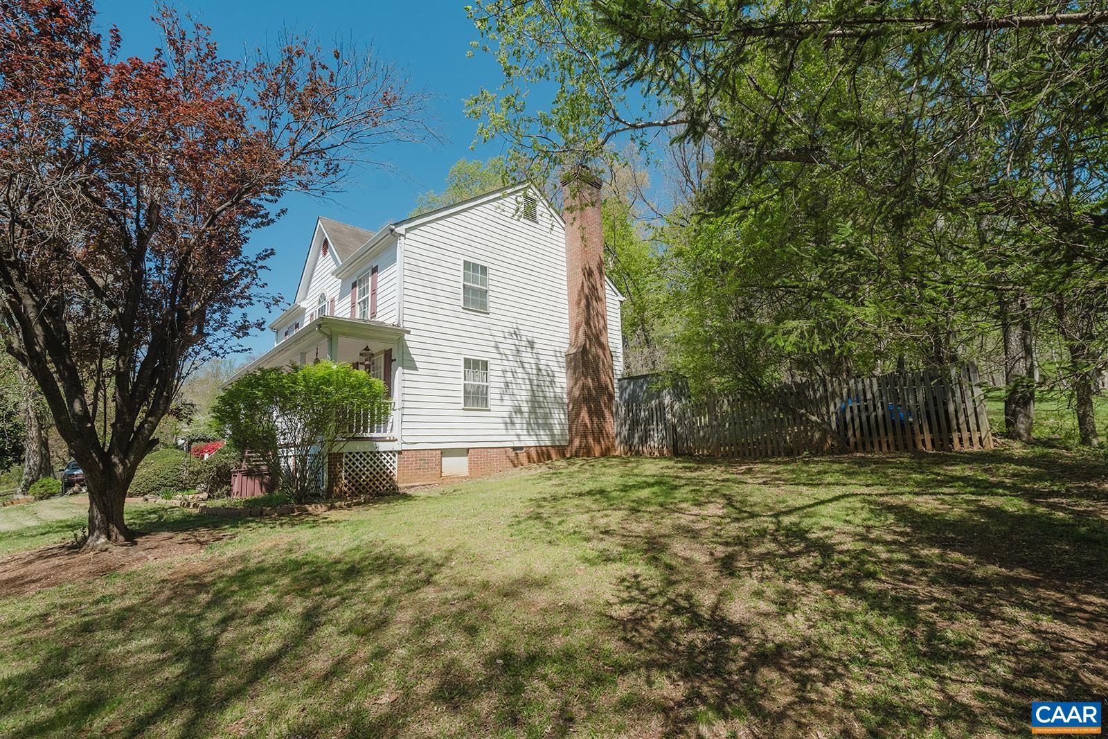 1642 Polo Grounds Road Charlottesville, VA 22911 - Photo 4 of 44 a view of a house with a yard