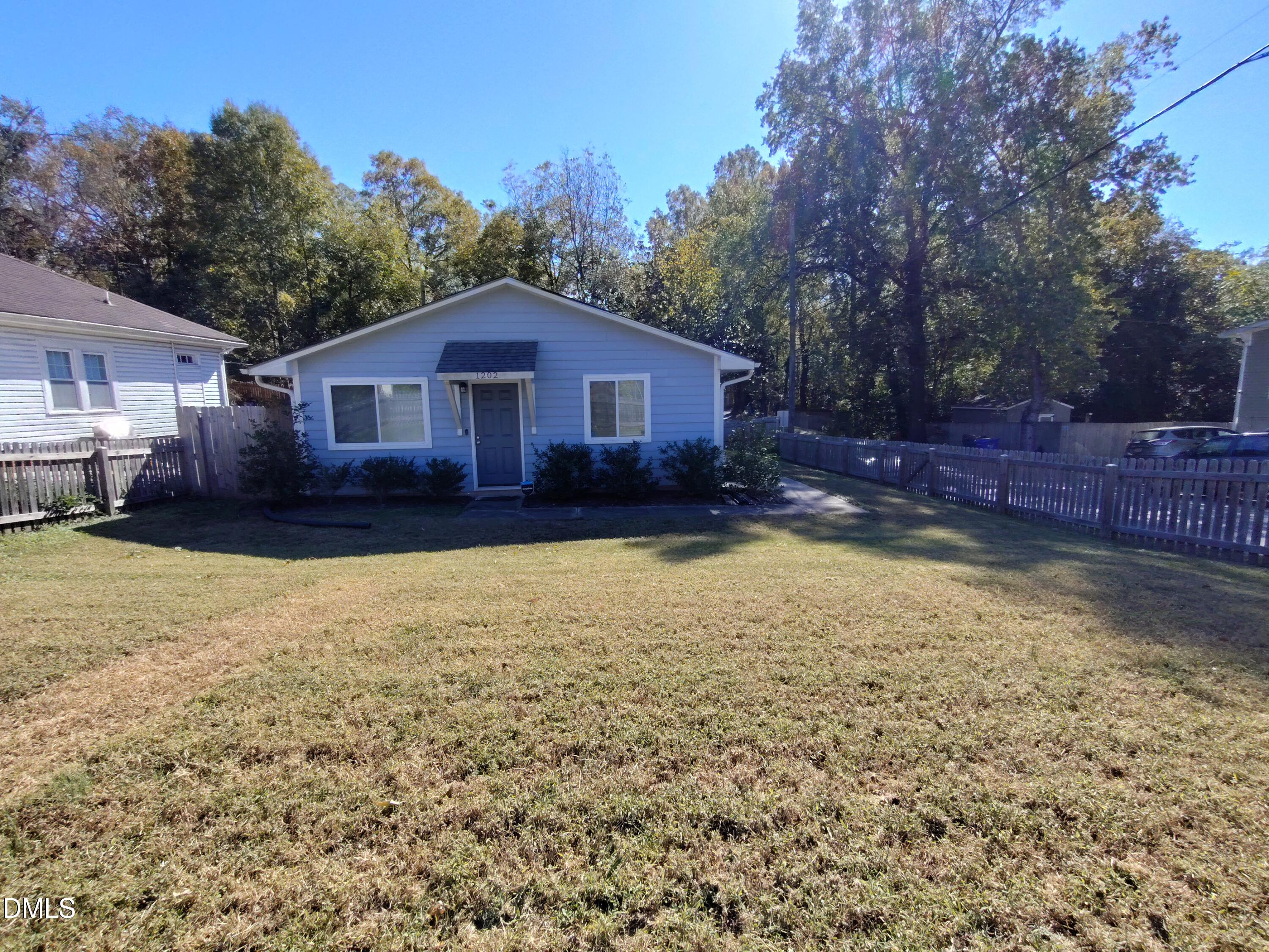 a view of house with outdoor space