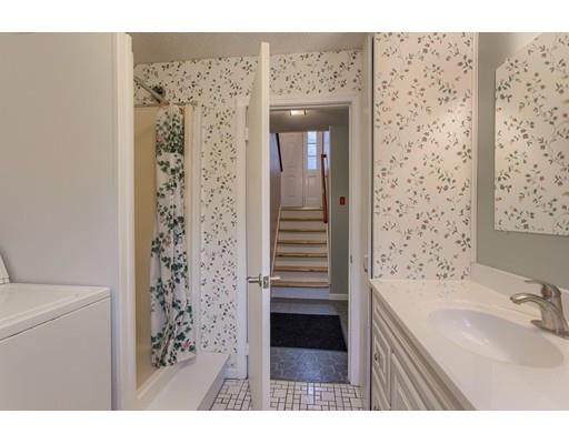 42 Corey Hill Road Ashburnham, MA 01430 - Photo 19 of 27 a bathroom with a sink a mirror and a shower