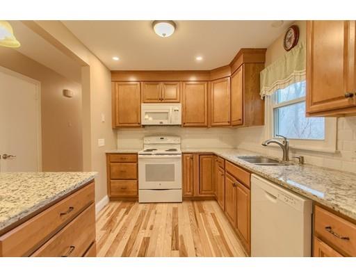 42 Corey Hill Road Ashburnham, MA 01430 - Photo 7 of 27 a kitchen with stainless steel appliances granite countertop a sink stove and refrigerator