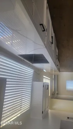 a view of a hallway with entryway