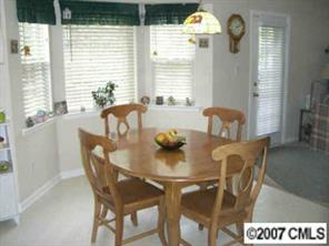6537 Nevin Road Charlotte, NC 28262 - Photo 5 of 8 a view of a dining room with furniture and window