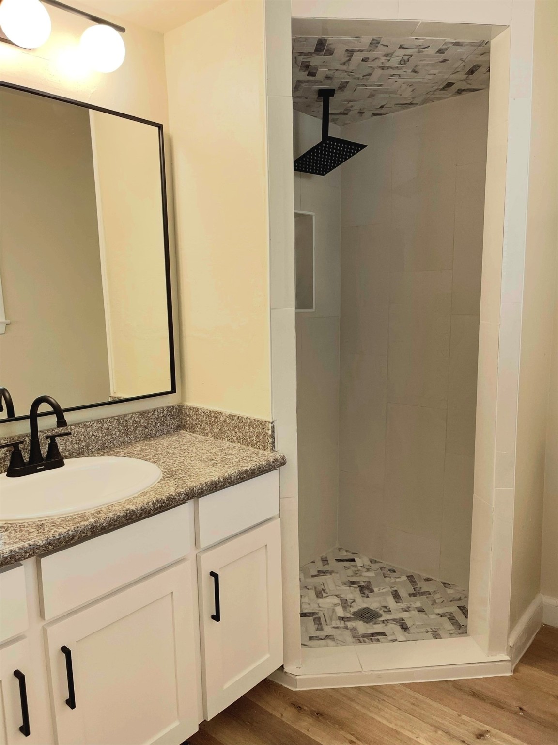 10331 Collingswood Road La Porte, TX 77571 - Photo 16 of 29 a bathroom with a granite countertop sink and a mirror