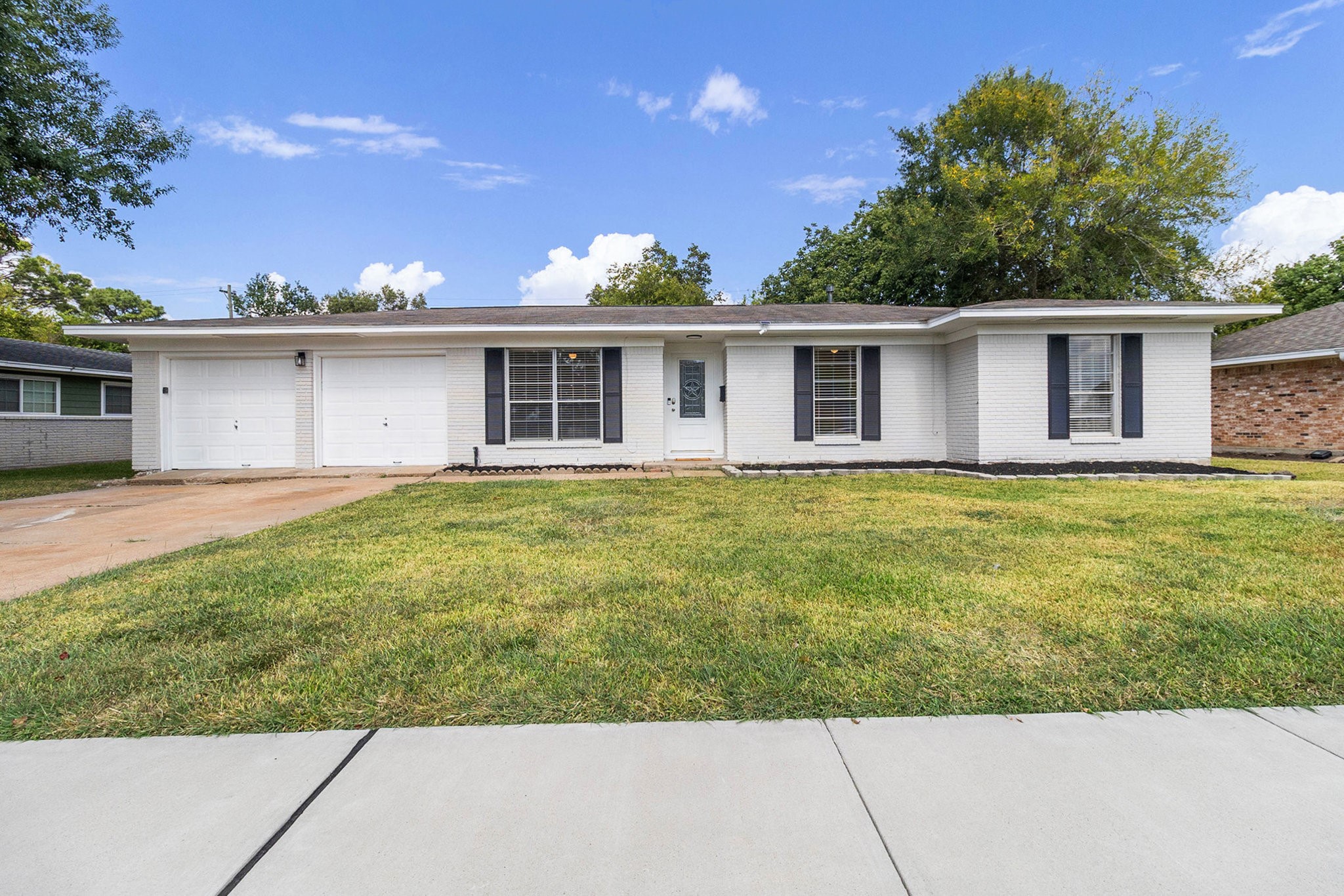 10331 Collingswood Road La Porte, TX 77571 - Photo 2 of 29 a front view of house with yard and trees in the background