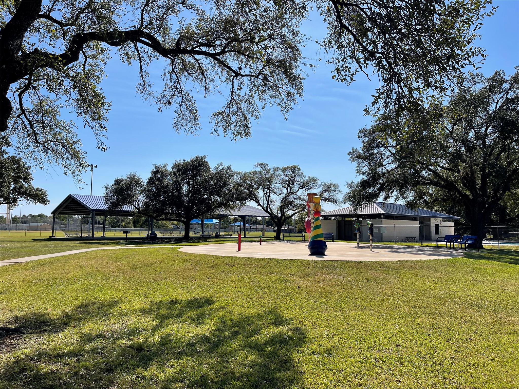 10331 Collingswood Road La Porte, TX 77571 - Photo 21 of 29 a view of a swimming pool with an outdoor space and seating area