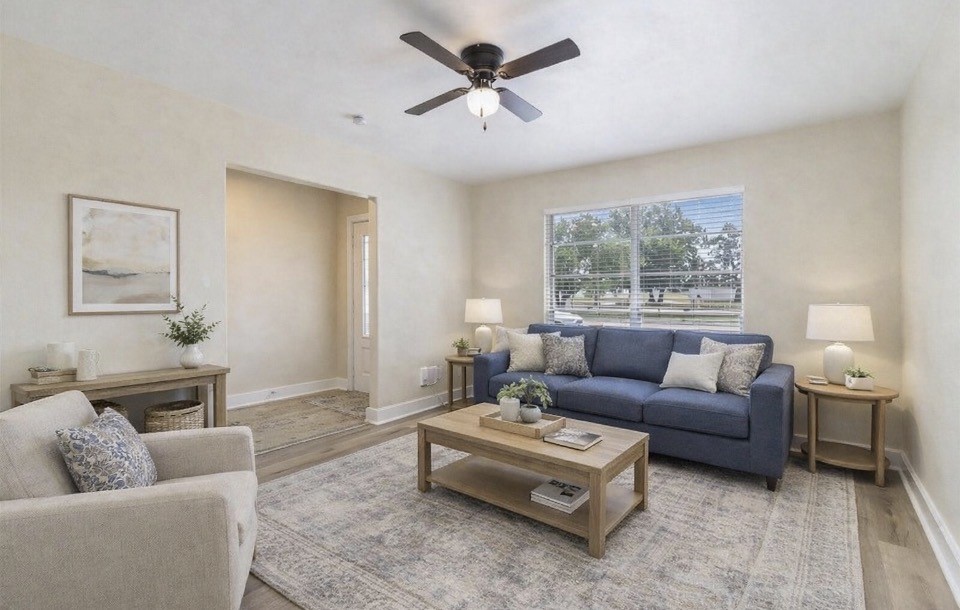 10331 Collingswood Road La Porte, TX 77571 - Photo 3 of 29 a living room with furniture and a large window