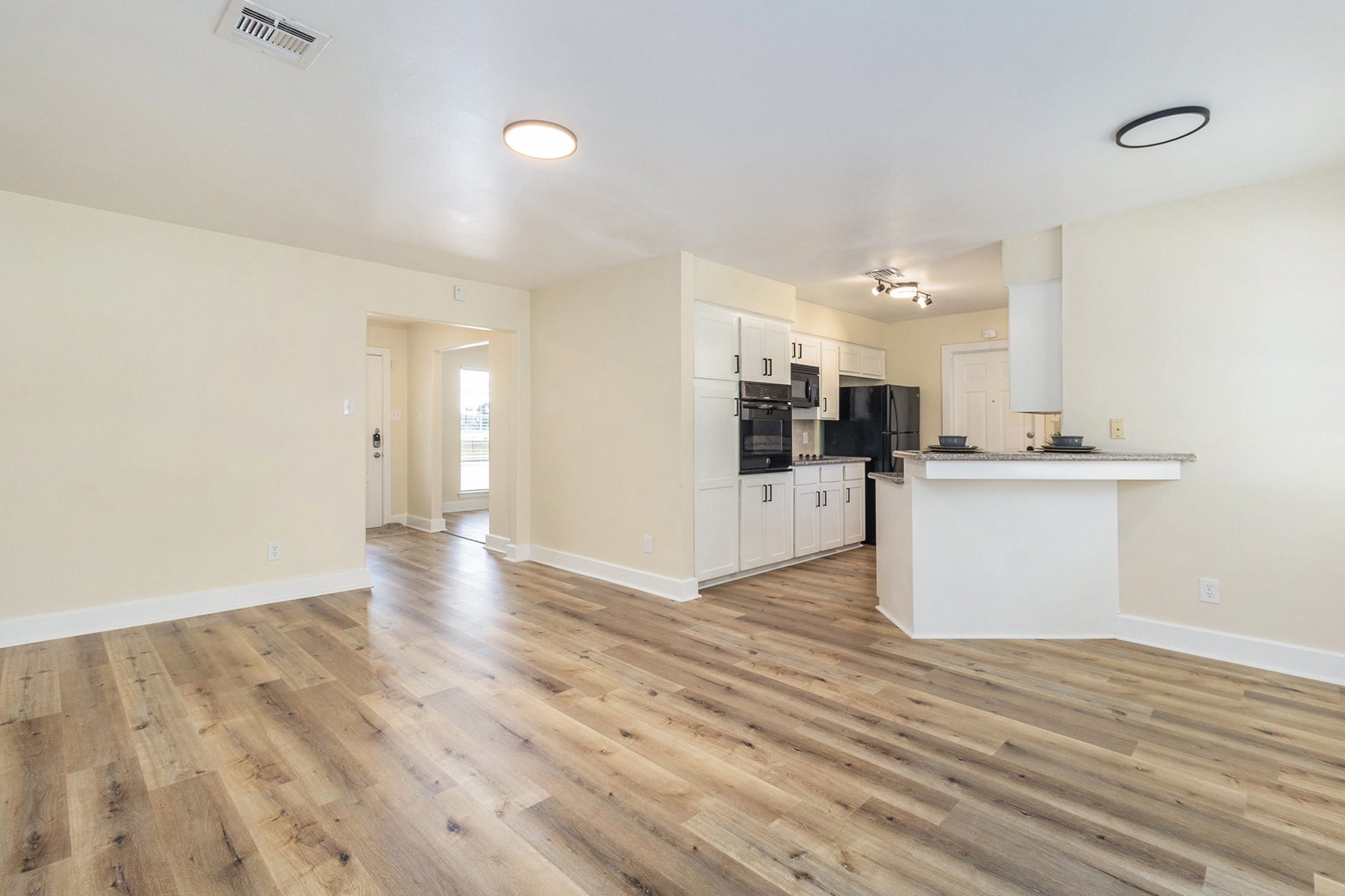 10331 Collingswood Road La Porte, TX 77571 - Photo 4 of 29 Spacious open-concept living area with a modern kitchen.