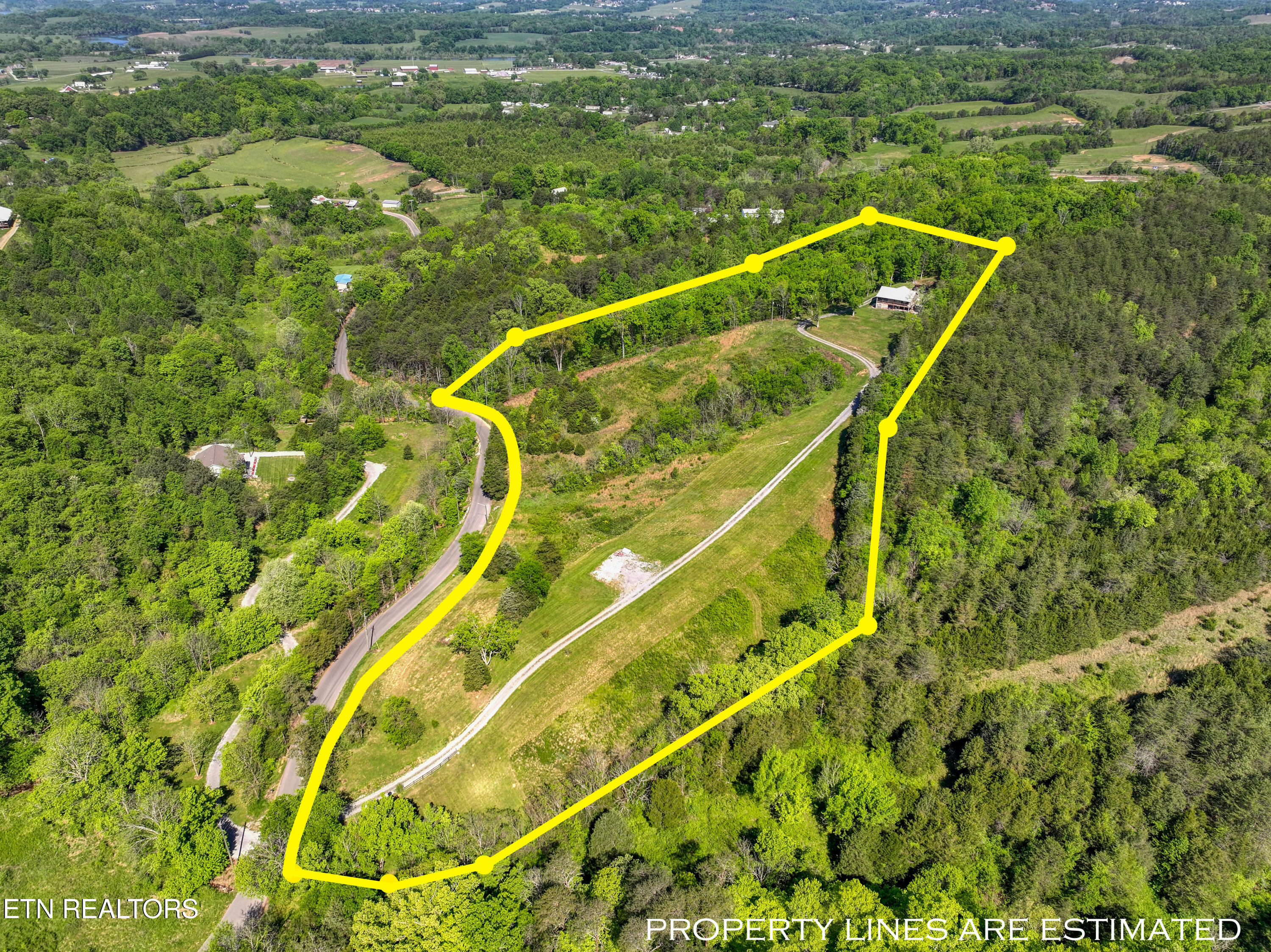 1424 Millican Grove Road Sevierville, TN 37876 - Photo 22 of 29 DJI_20260422105604_0486_D_87