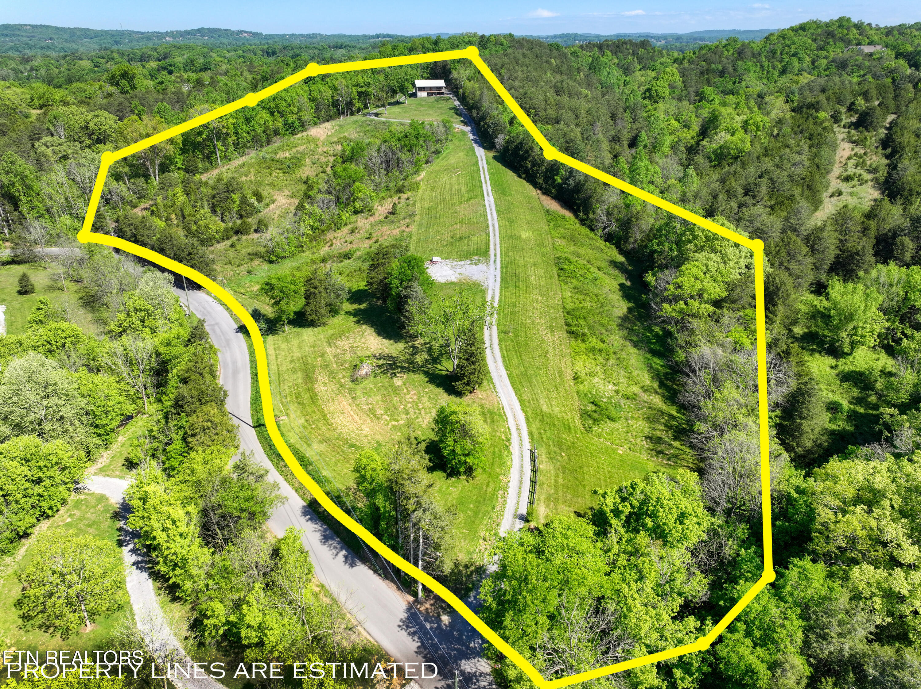 1424 Millican Grove Road Sevierville, TN 37876 - Photo 23 of 29 DJI_20260422110113_0545_D_98