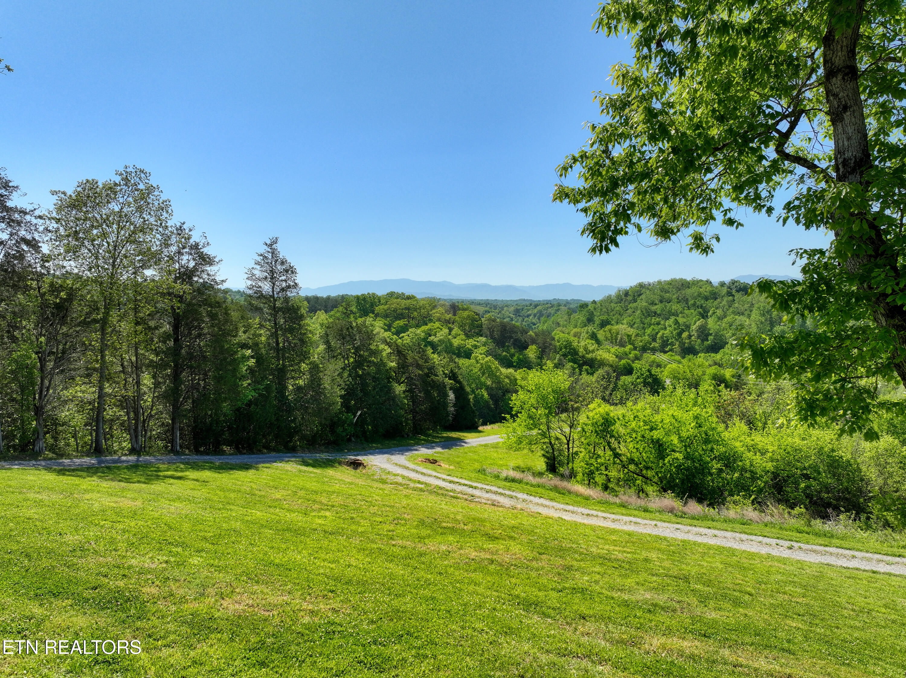 1424 Millican Grove Road Sevierville, TN 37876 - Photo 27 of 29 DJI_20260422105949_0525_D_94