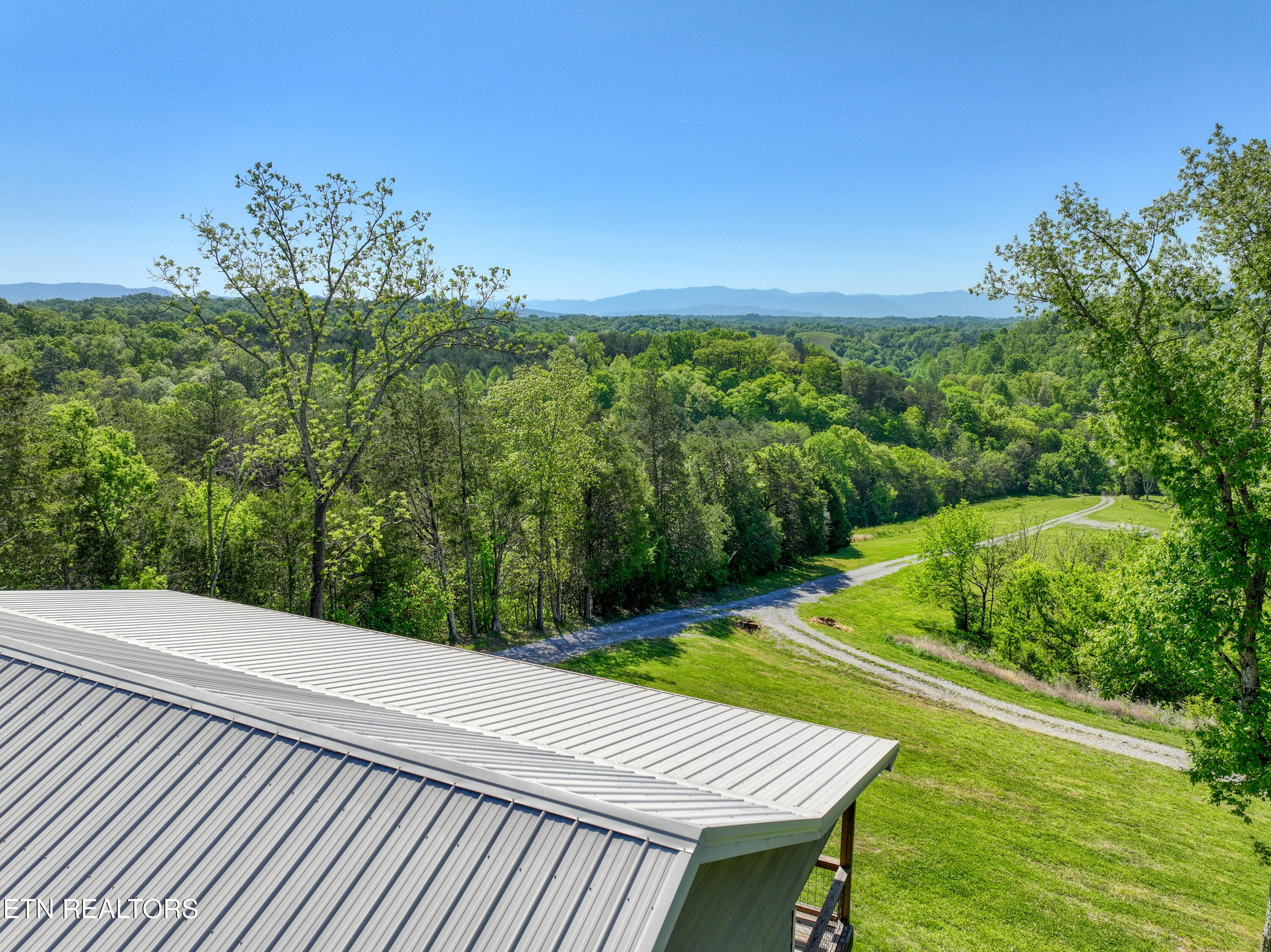 1424 Millican Grove Road Sevierville, TN 37876 - Photo 28 of 29 DJI_20260422105753_0495_D_88