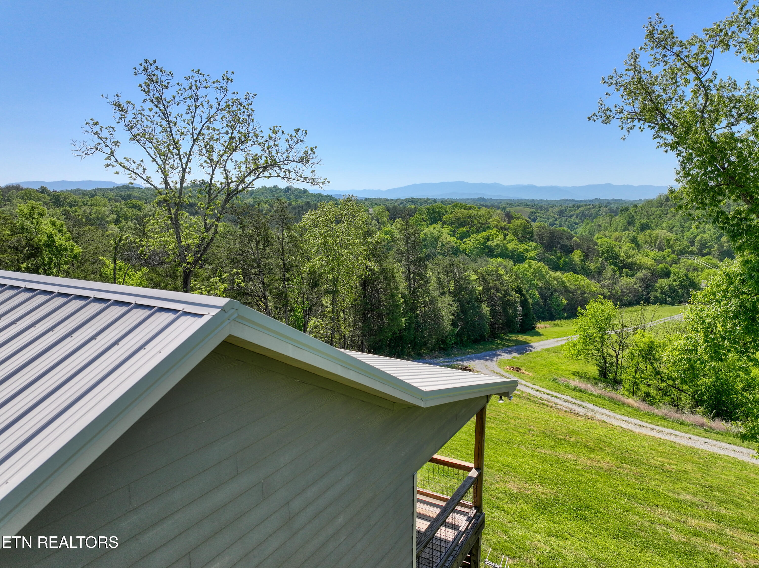 1424 Millican Grove Road Sevierville, TN 37876 - Photo 4 of 29 DJI_20260422105759_0496_D_89
