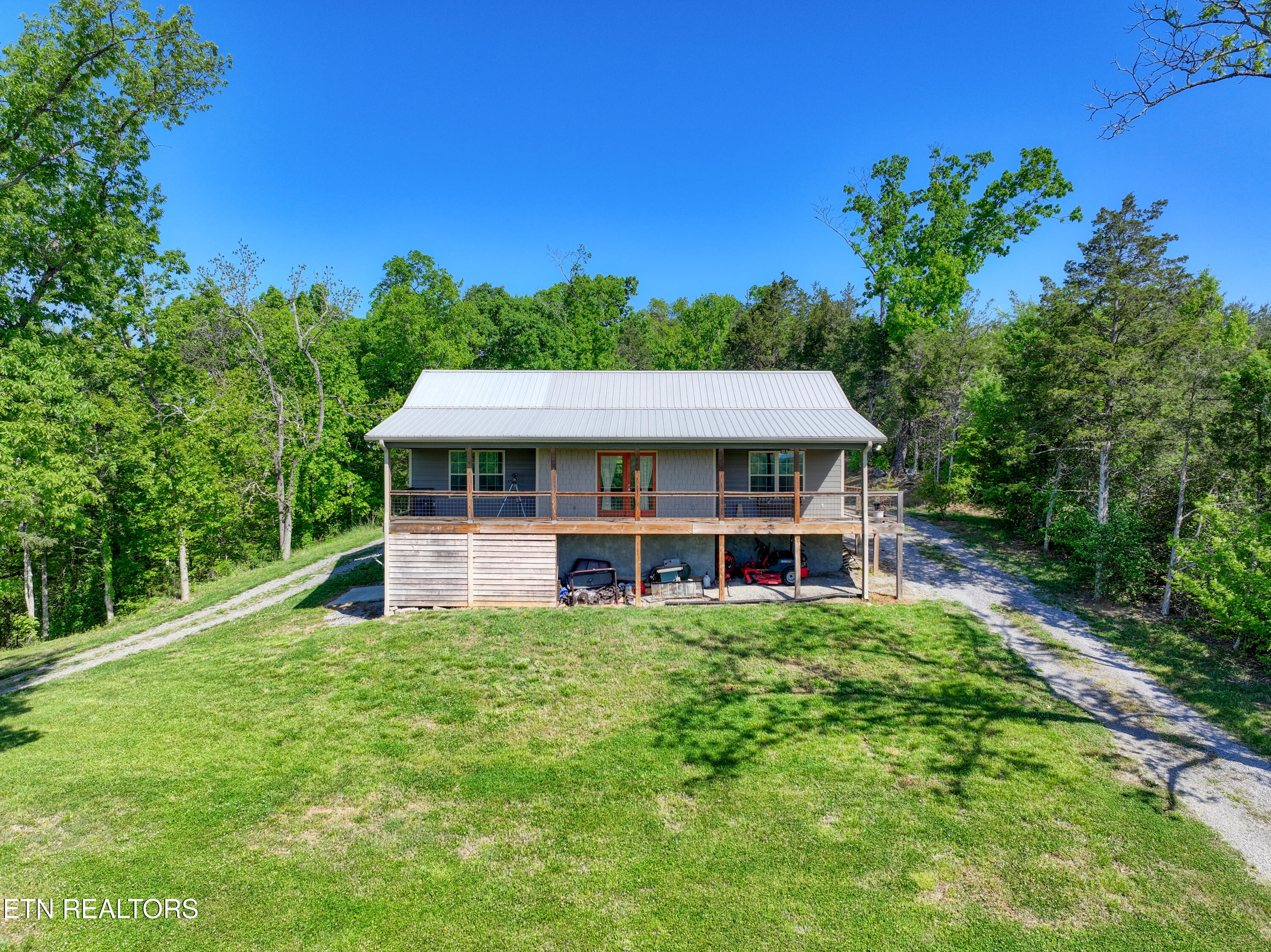 1424 Millican Grove Road Sevierville, TN 37876 - Photo 7 of 29 DJI_20260422105921_0520_D_93