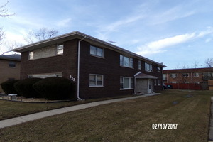 932 Elder Road Homewood, IL 60430 - Photo 1 of 1 a front view of a house