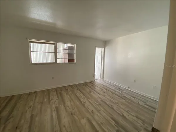 a bathroom with a shower toilet and sink