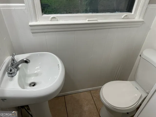 a bathroom with a sink and a toilet