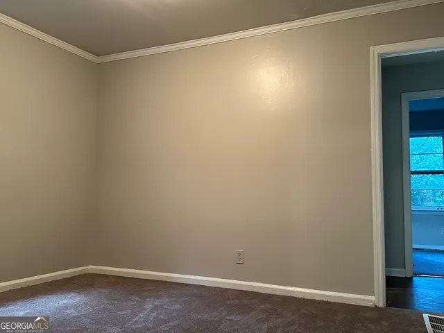 an empty room with a workbench