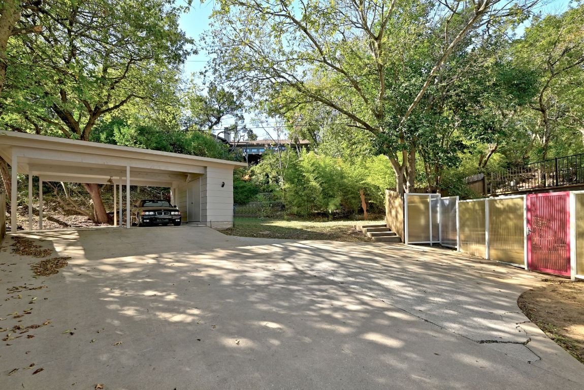 6210 Shadow Valley Drive, Unit A Austin, TX 78731 - Photo 29 of 29 Driveway and carport for upstairs unit
