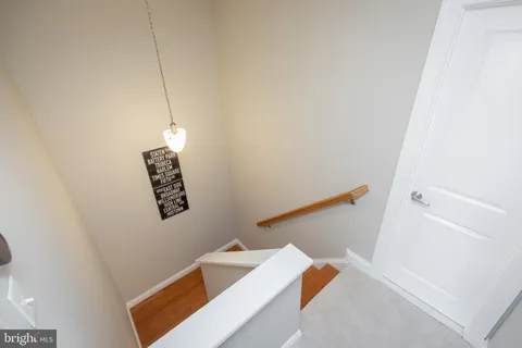 a bathroom with a shower a toilet and sink