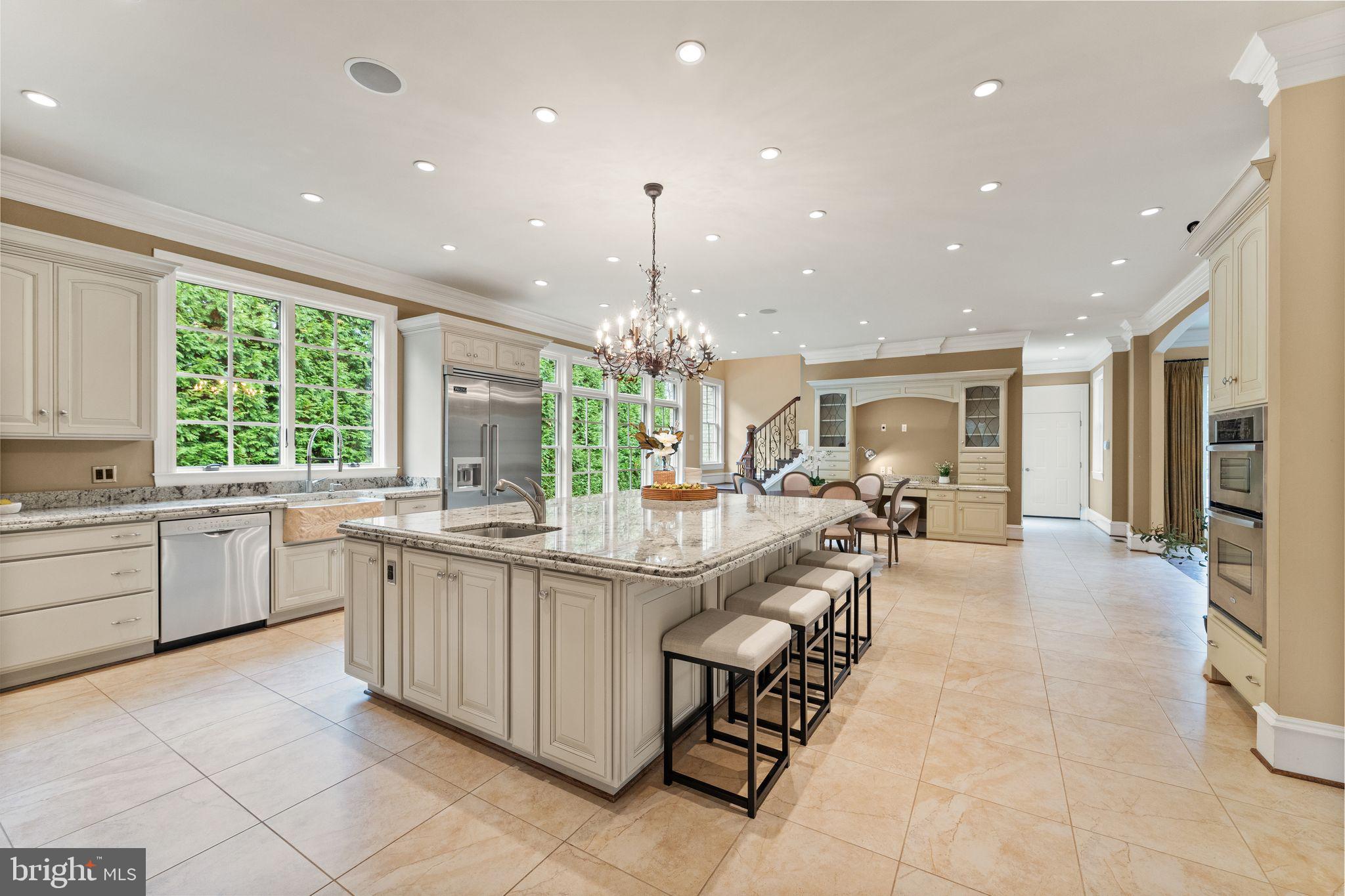 1105 Towlston Road McLean, VA 22102 - Photo 15 of 50 Oversized island, wall of windows & built-ins