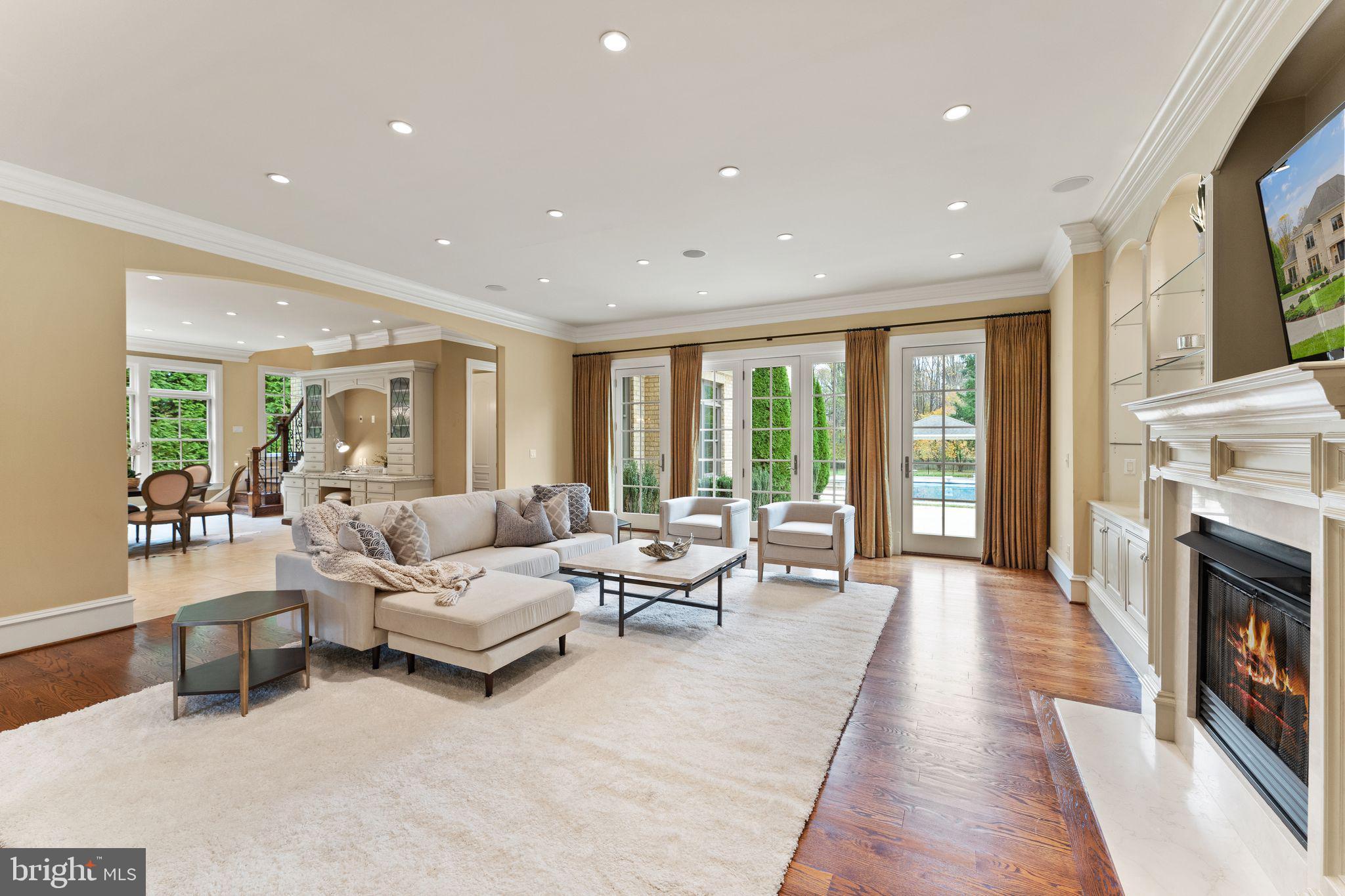 1105 Towlston Road McLean, VA 22102 - Photo 20 of 50 Family room w/ view of pool through french doors