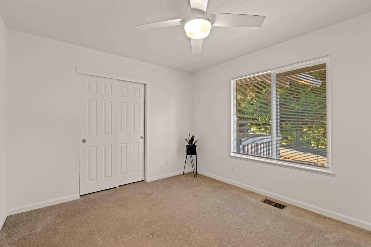 5341 Puerta Del Sol Road Camino, CA 95709 - Photo 19 of 32 a view of an empty room with a window