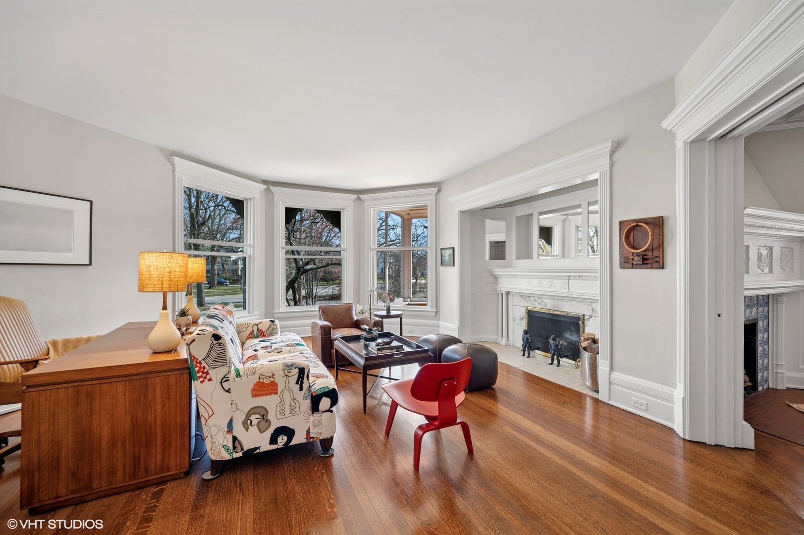 644 Oak Street Winnetka, IL 60093 - Photo 19 of 40 a living room with furniture and a fireplace