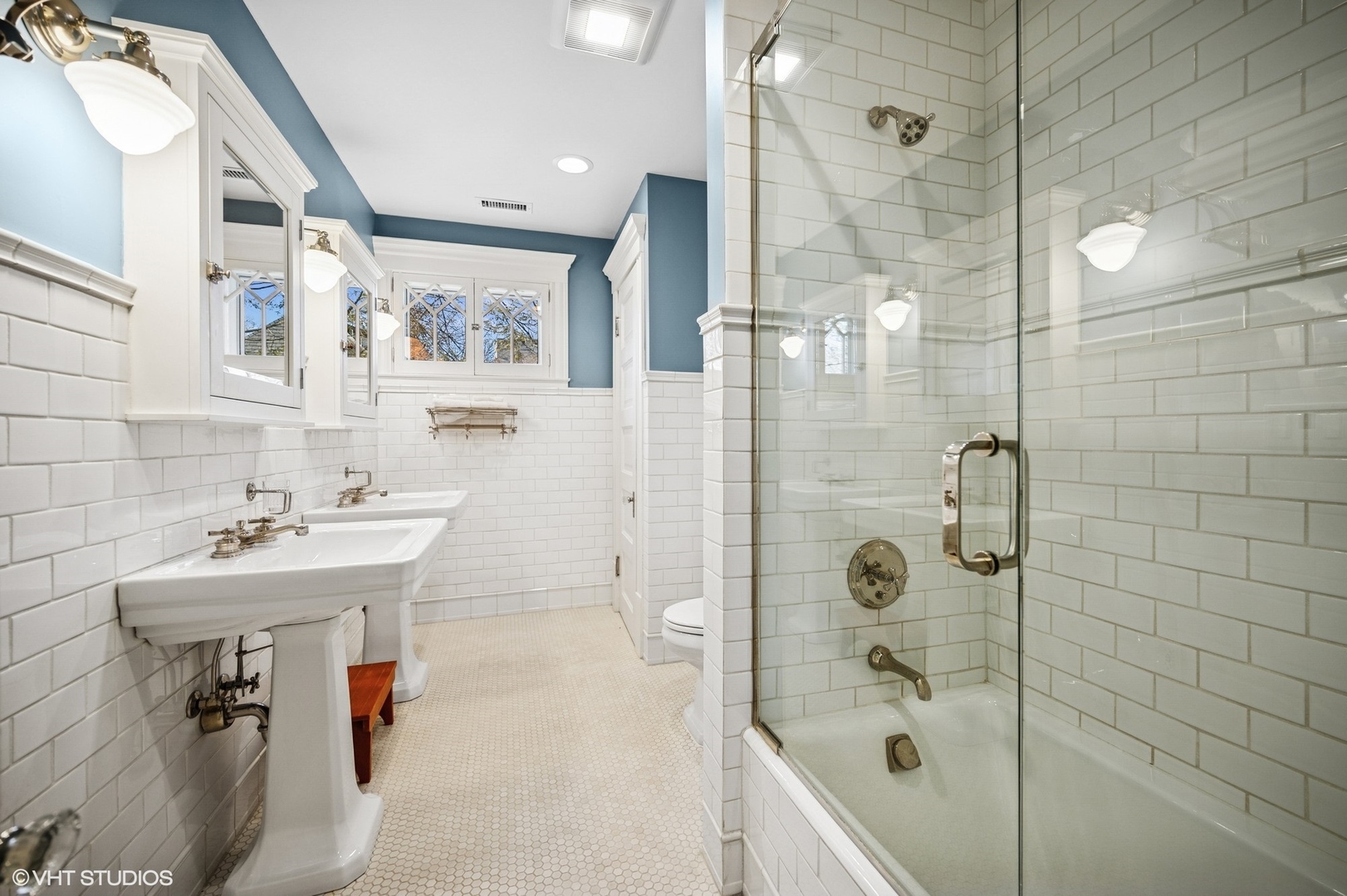644 Oak Street Winnetka, IL 60093 - Photo 32 of 40 a bathroom with a sink a toilet and shower