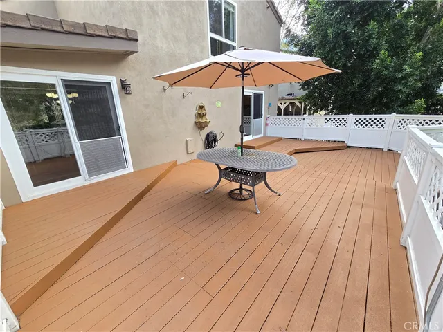 wooden floor and window in an empty room