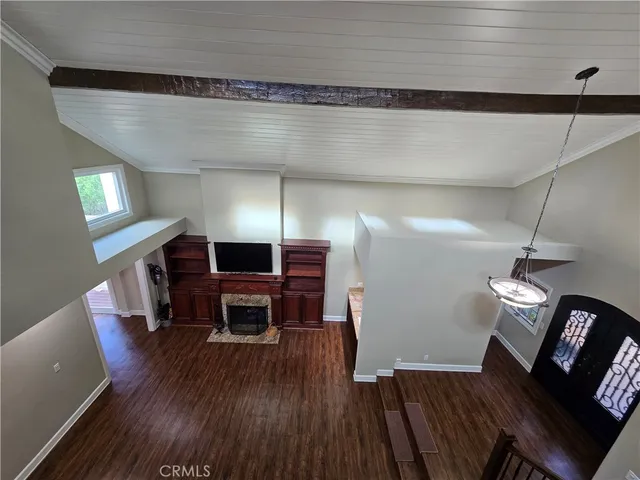a bathroom with a granite countertop double vanity sink and mirror
