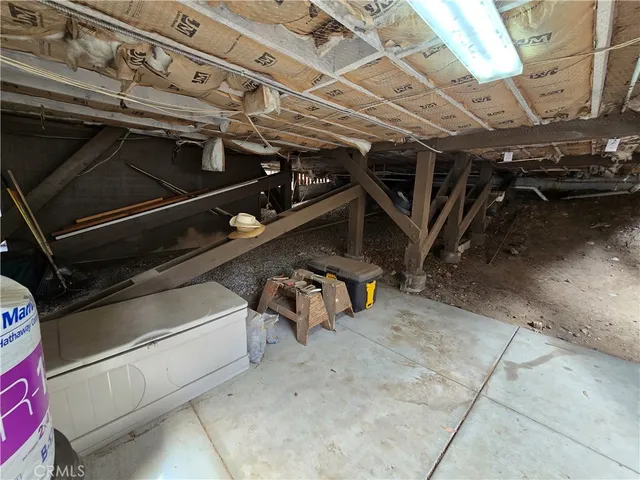 a view of a wooden deck and a yard