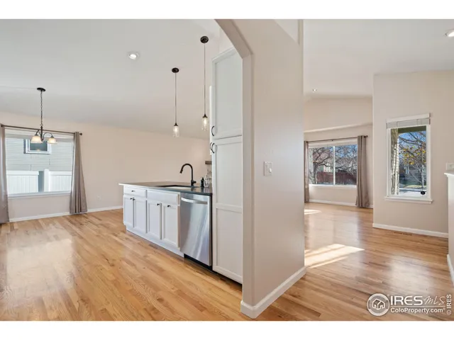 a view of a kitchen with electric appliances