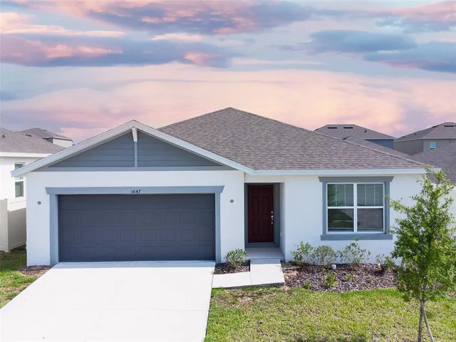 a front view of house with yard