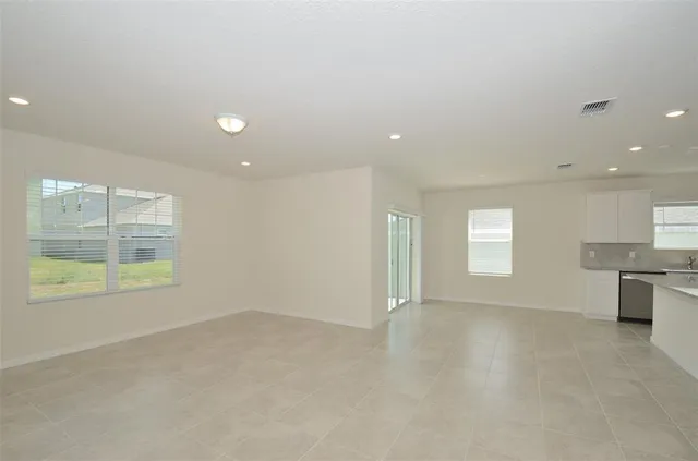 a kitchen with sink and window