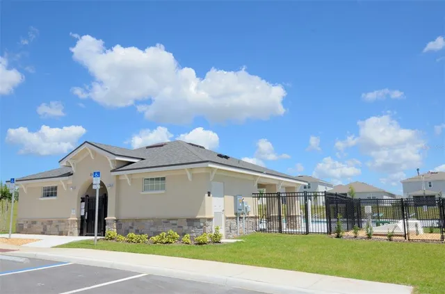an aerial view of residential building with parking space