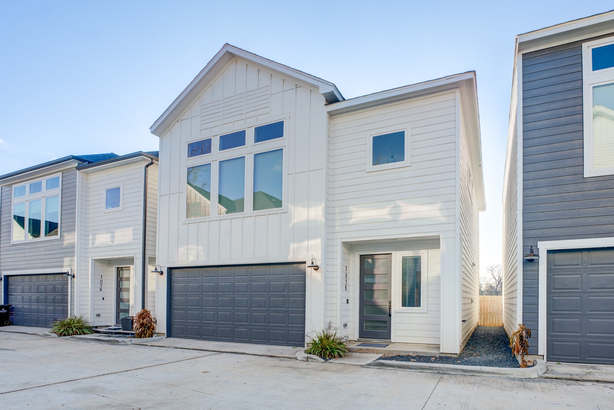 107 West Whitney Street, Unit E Houston, TX 77018 - Photo 2 of 48 a front view of a house with garage